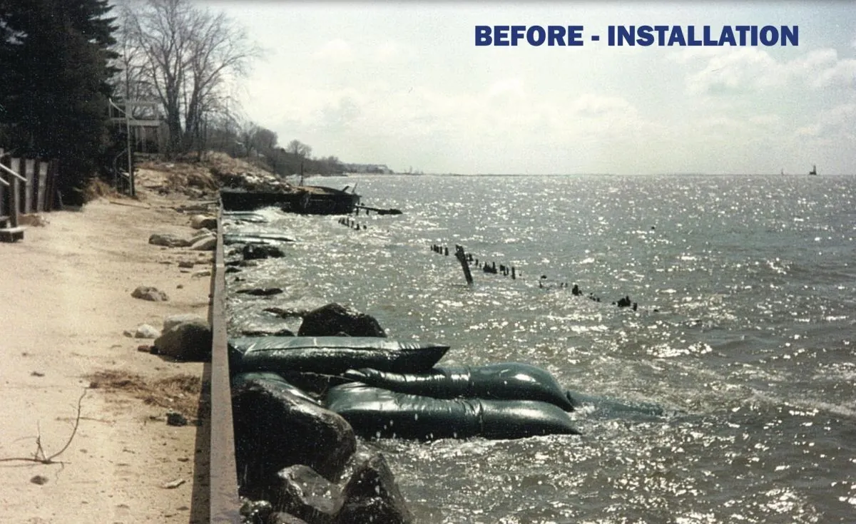 A refinery shoreline in Saudi Arabia, 1999: the eroded coast before installation, with the waterline cut back against the shore.
